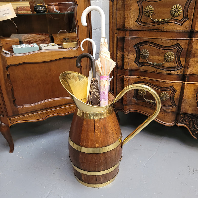 Stunning French Oak and brass jug which could be used as an umbrella stand. It has been sourced from France and is in good original detailed condition. Circa 1950's.