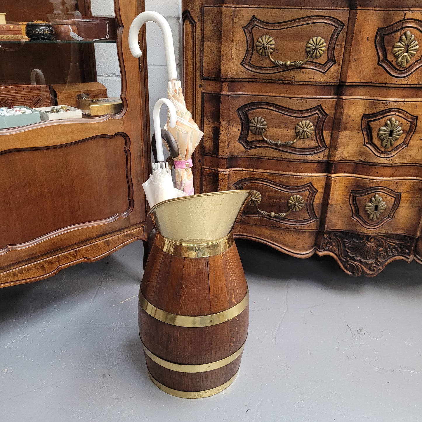 Stunning French Oak and brass jug which could be used as an umbrella stand. It has been sourced from France and is in good original detailed condition. Circa 1950's.
