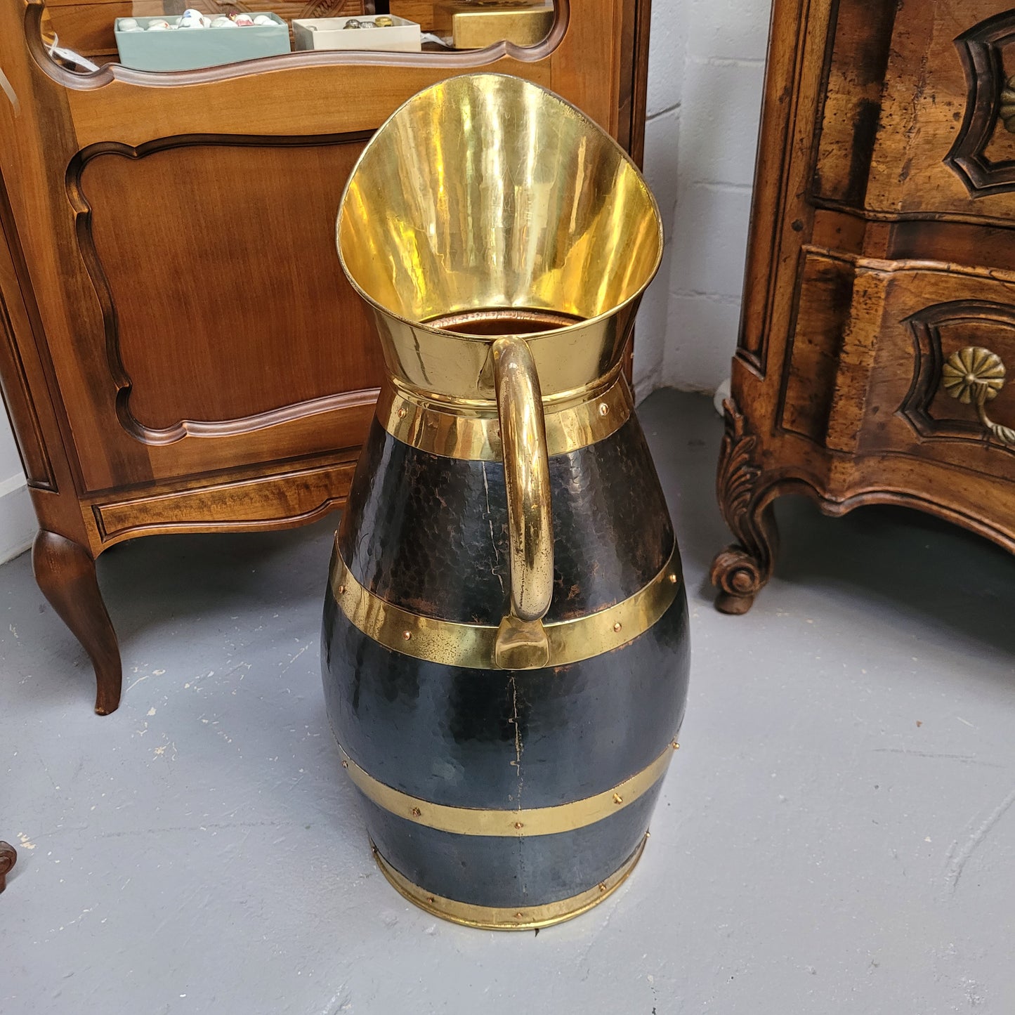 Large Antique copper and brass jug that could be used as an umbrella stand. Sourced from France and is in good original detailed condition.