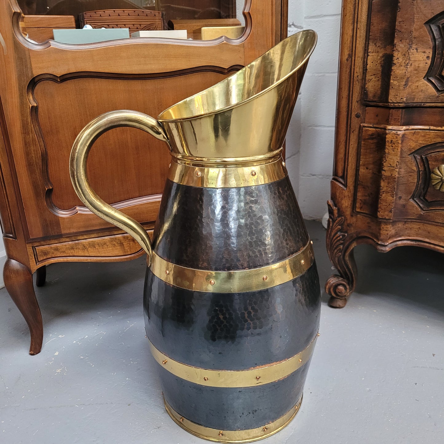 Large Antique copper and brass jug that could be used as an umbrella stand. Sourced from France and is in good original detailed condition.