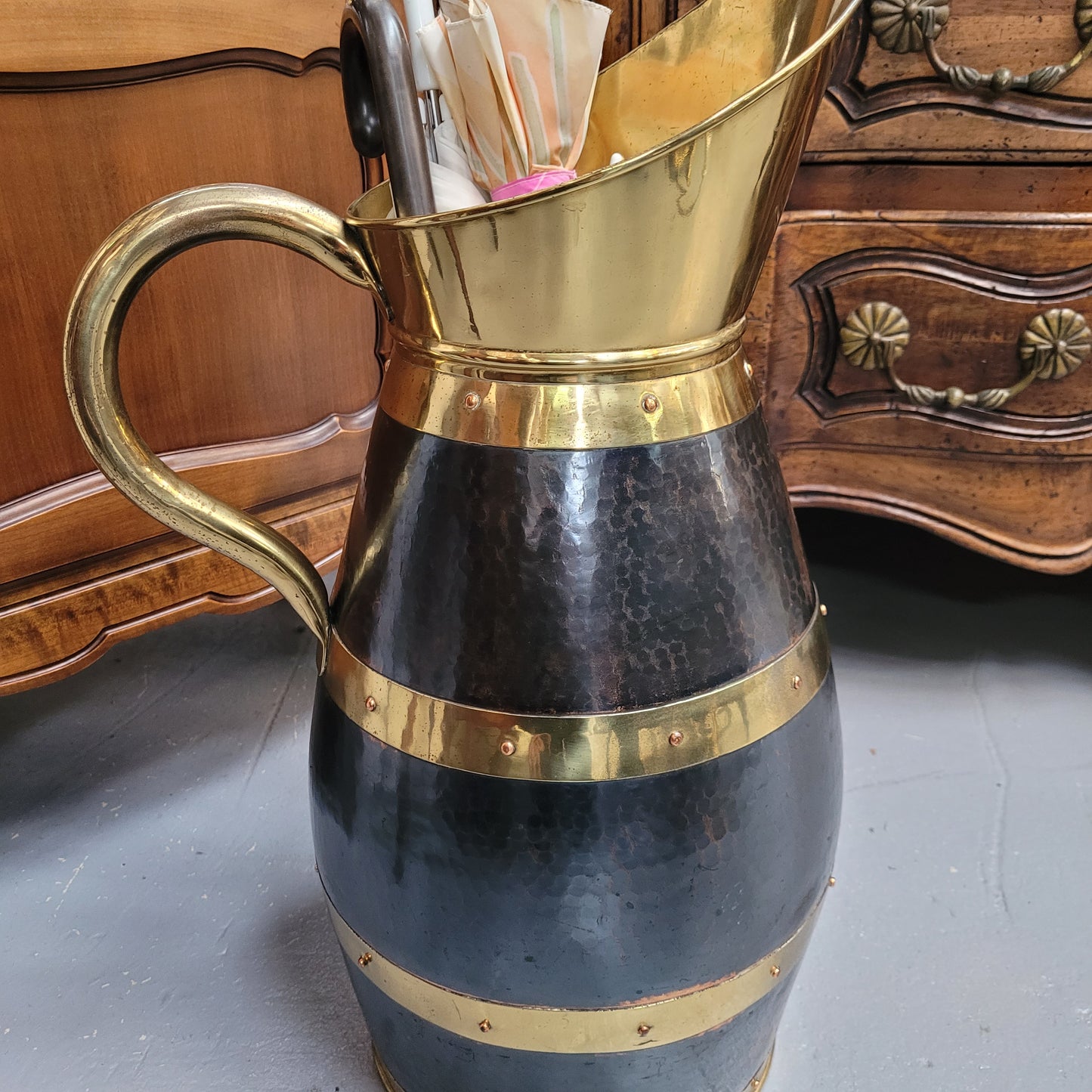 Large Antique copper and brass jug that could be used as an umbrella stand. Sourced from France and is in good original detailed condition.