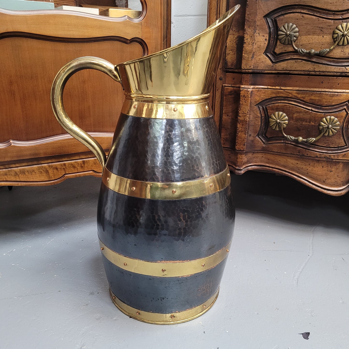 Large Antique copper and brass jug that could be used as an umbrella stand. Sourced from France and is in good original detailed condition.