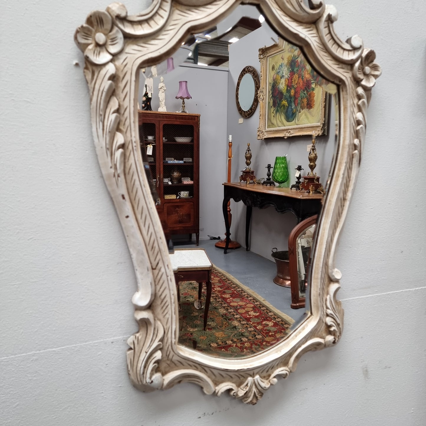 Attractive cream Louis XV style bevilled edge wall mirror. Circa:1930's. In good original condition and has been sourced directly from France.