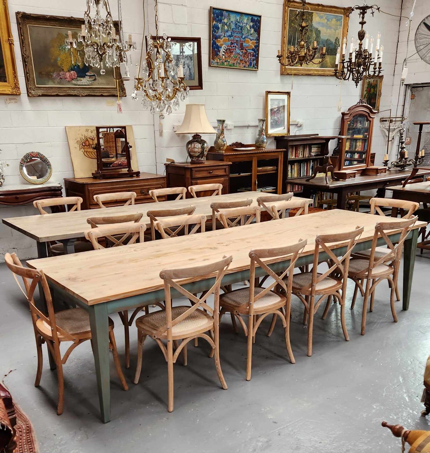 Bring the charm of rustic farmhouse style to your home with this handcrafted 3m Farmhouse style reclaimed Pine dining table. Seats 10 - 12 people. Material: Reclaimed Pine top and Reclaimed Pine base Colour: white washed and waxed natural timber top with Antique olive green base.