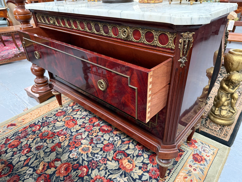 French Louis XVI Style Flame Mahogany Marble Top Commode