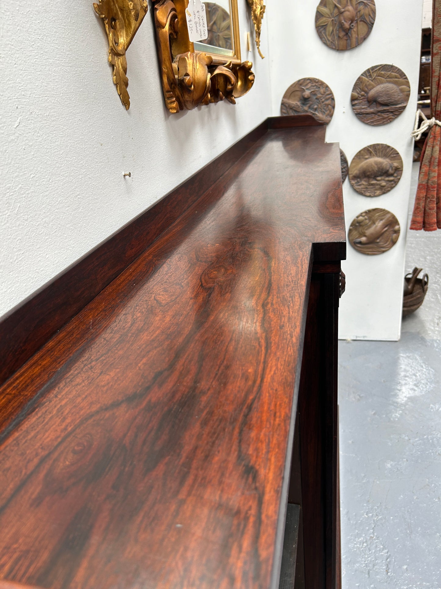 A very functional and highly desirable Rosewood Antique early 19th century free-standing breakfront bookcase. Shelves are adjustable, and trim is in great detailed condition.
