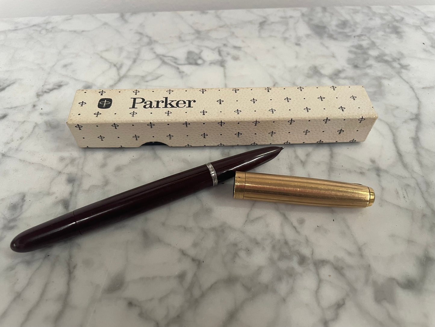 Parker 51 14ct Rolled Gold fountain pen in original box. In good condition.