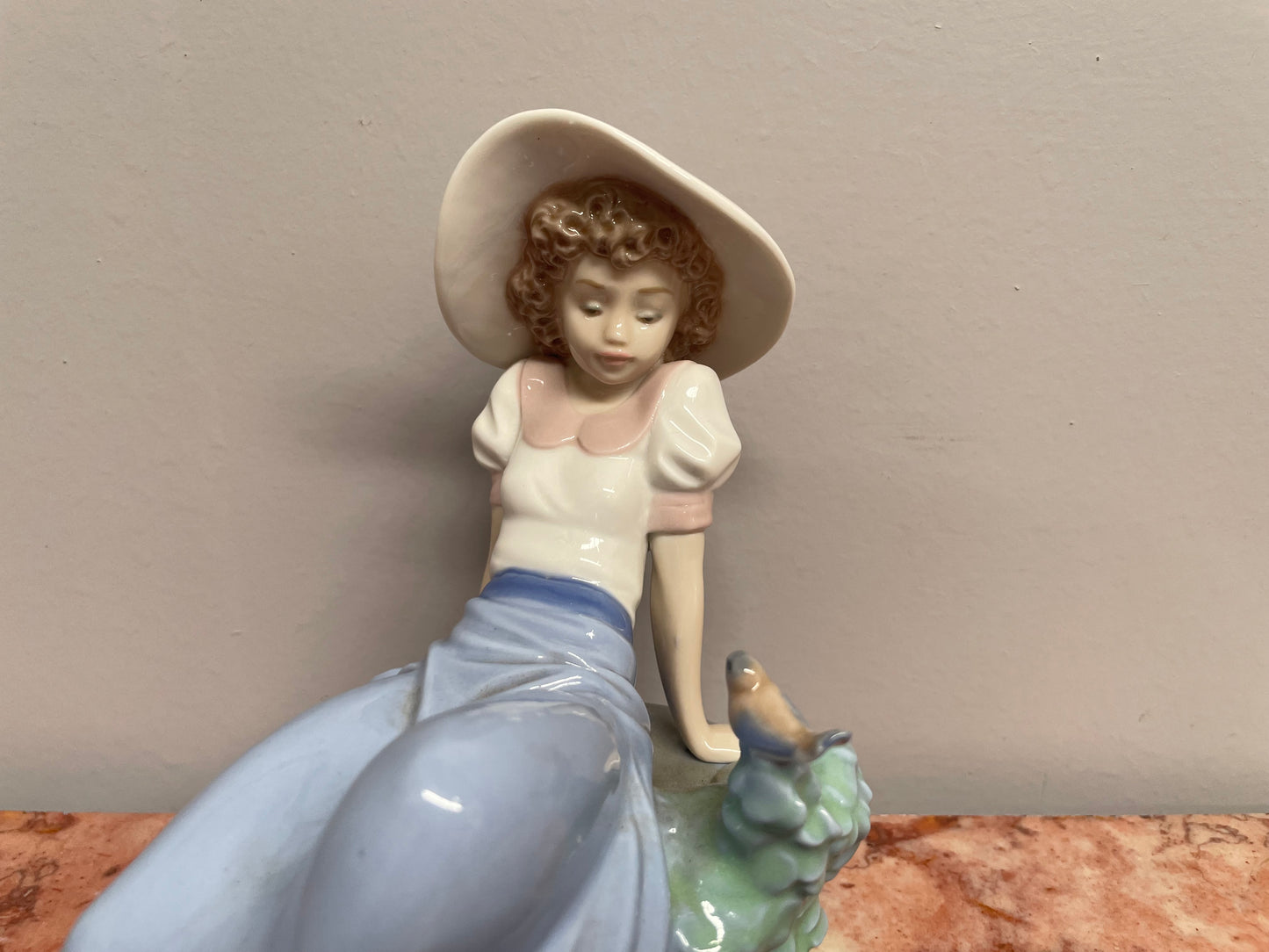 Nao Girl With Bird Figurine