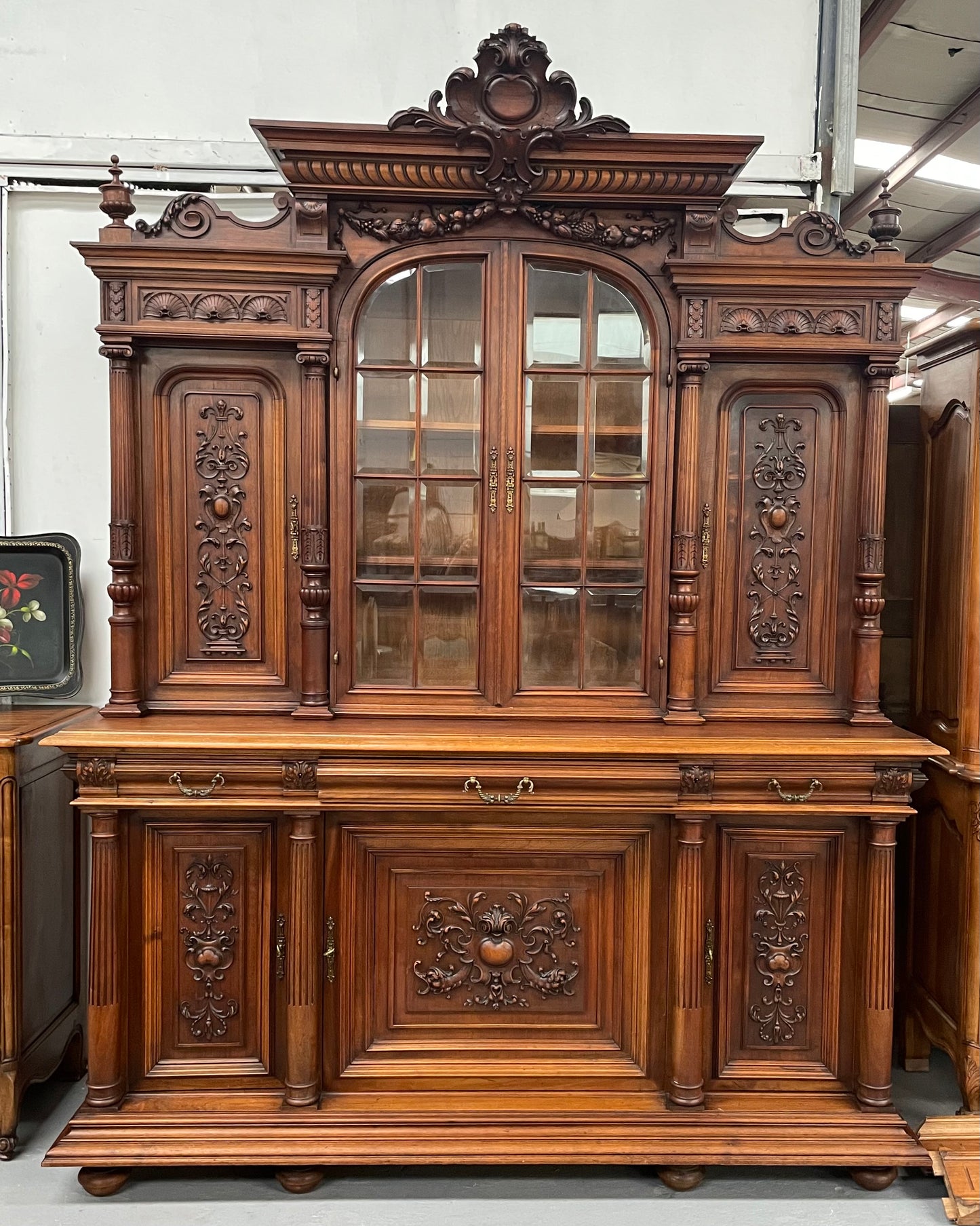 French Walnut Renaissance style 19th Century buffet /sideboard of grand proportions. It is beautifully carved and in very good original de