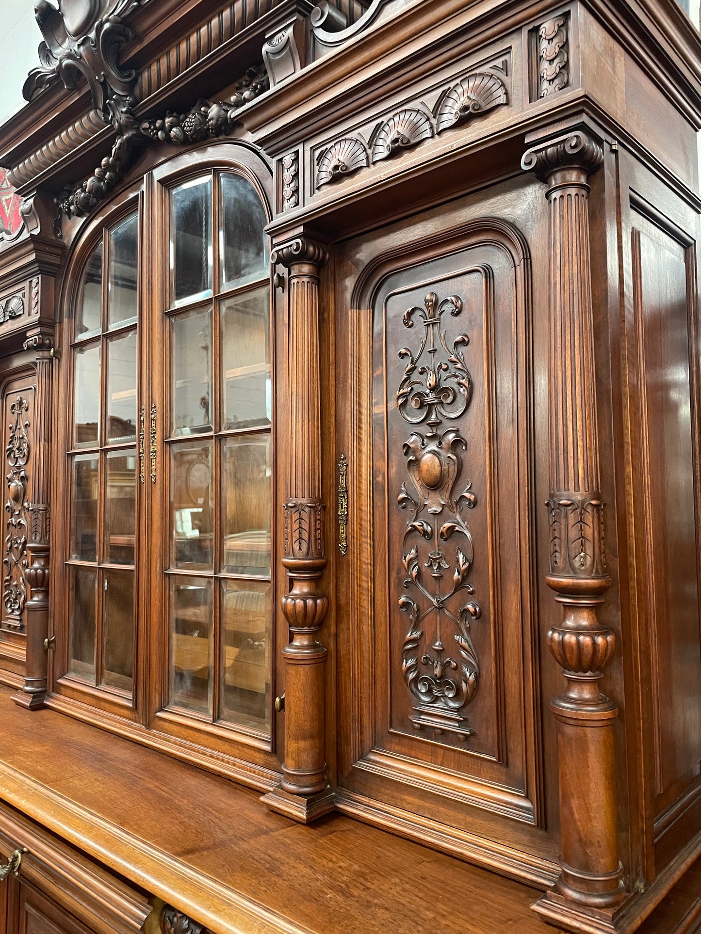 French Walnut Renaissance style 19th Century buffet /sideboard of grand proportions. It is beautifully carved and in very good original de
