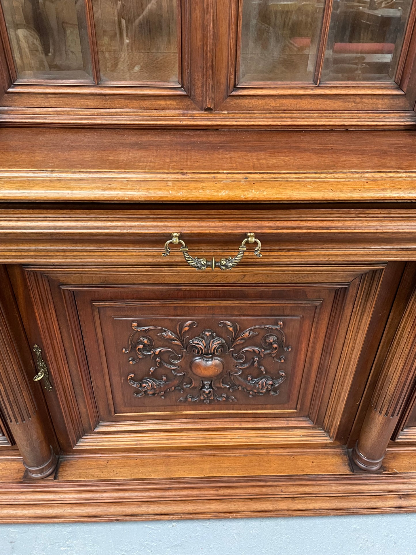 French Walnut Renaissance style 19th Century buffet /sideboard of grand proportions. It is beautifully carved and in very good original de