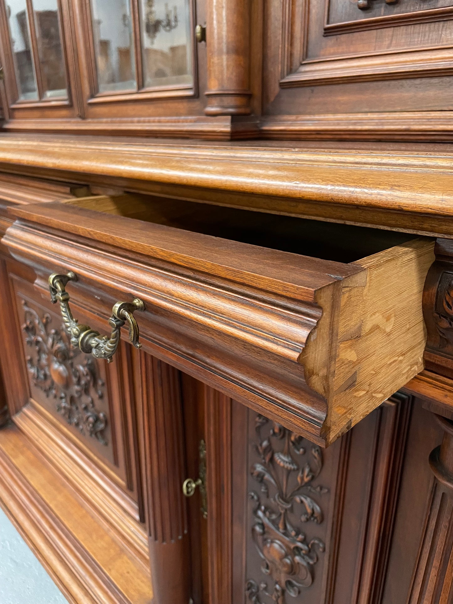 French Walnut Renaissance style 19th Century buffet /sideboard of grand proportions. It is beautifully carved and in very good original de