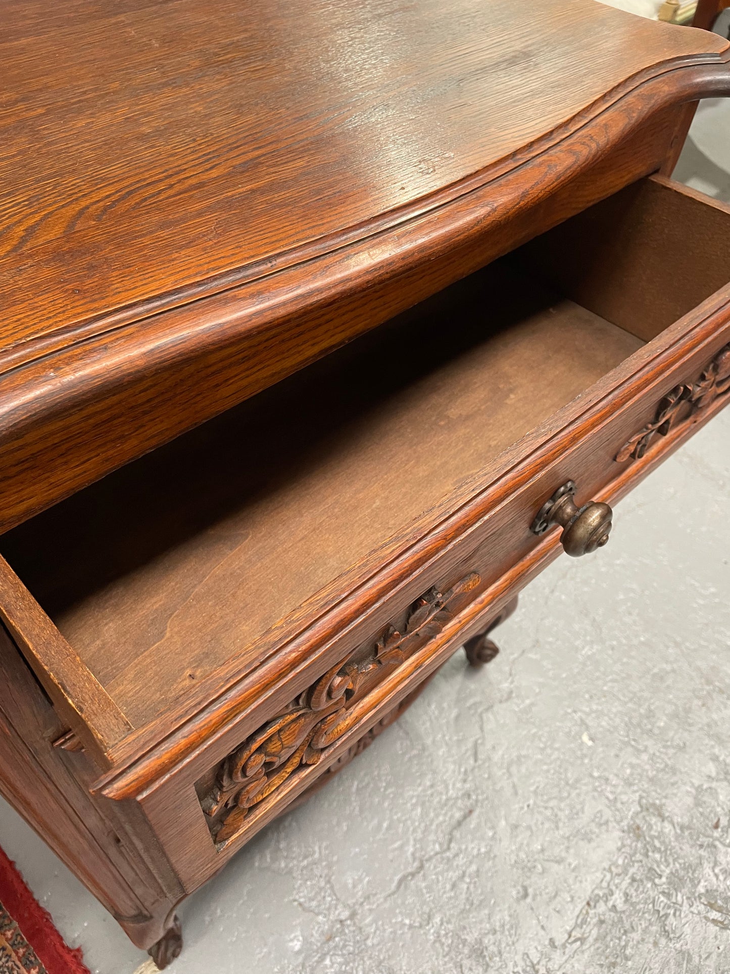 Beautiful French oak Louis XV style carved chest of three drawers with lovely details and in good original detailed condition. Sourced from France.