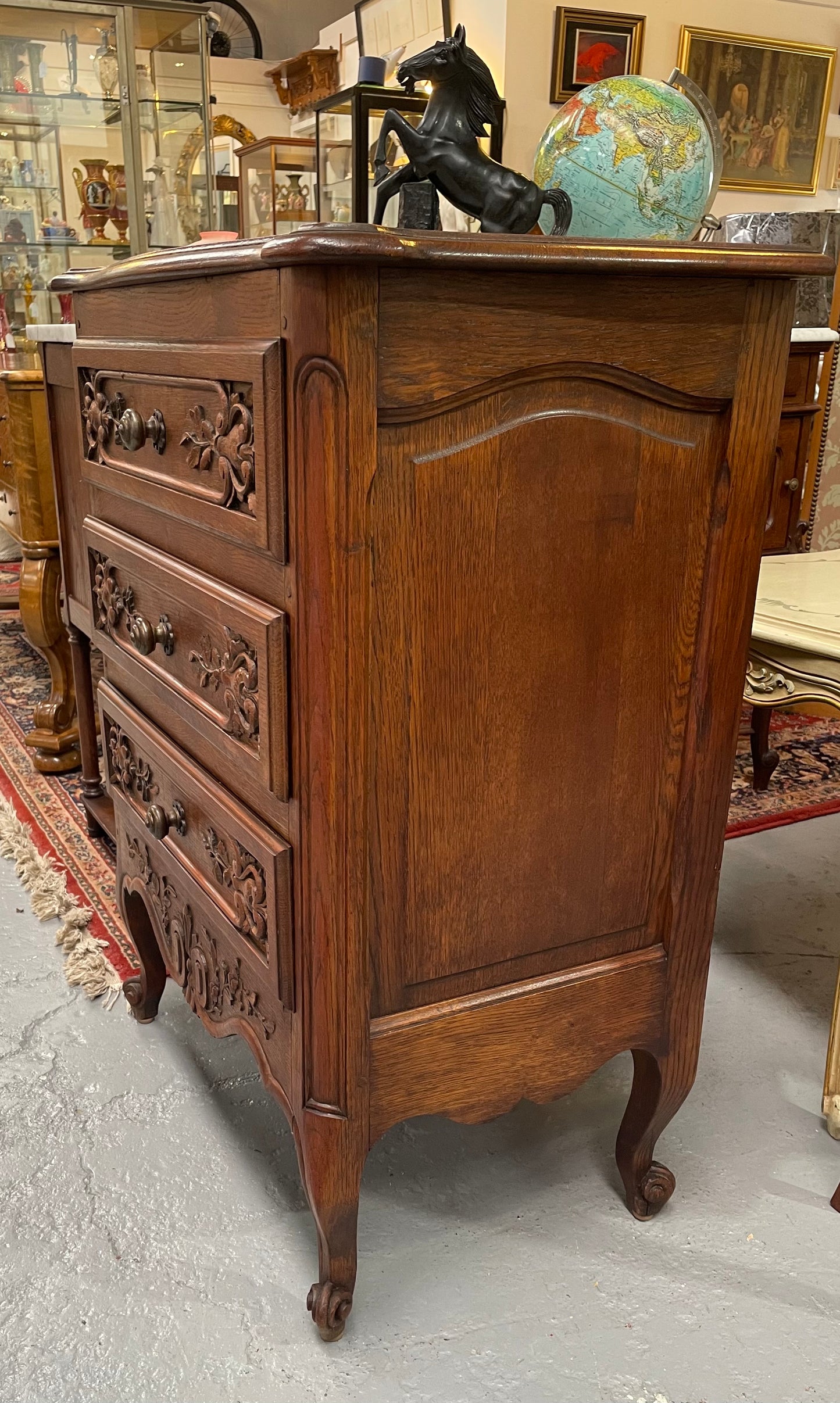 Beautiful French oak Louis XV style carved chest of three drawers with lovely details and in good original detailed condition. Sourced from France.