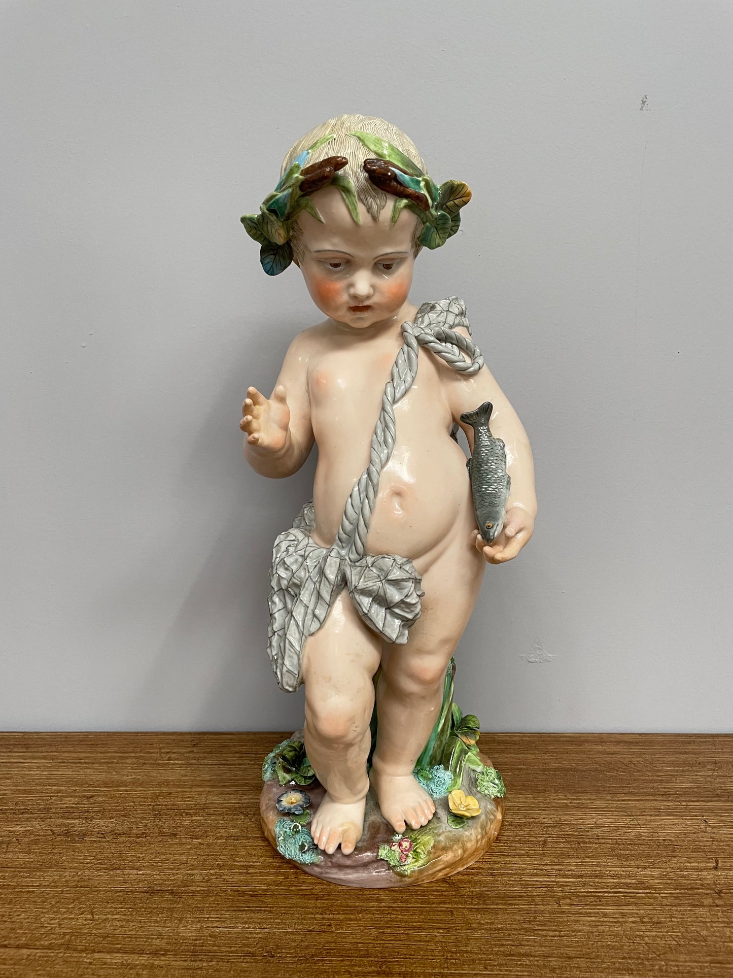 Lovely large Antique Meissen porcelain cherub statue underglaze blue mark late 18th/early 19th Century. It is in good original condition.