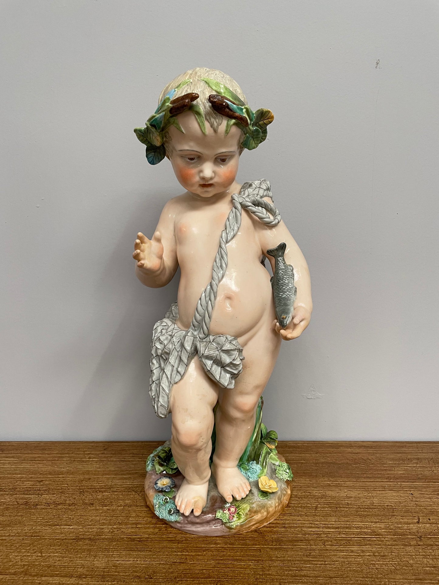 Lovely large Antique Meissen porcelain cherub statue underglaze blue mark late 18th/early 19th Century. It is in good original condition.