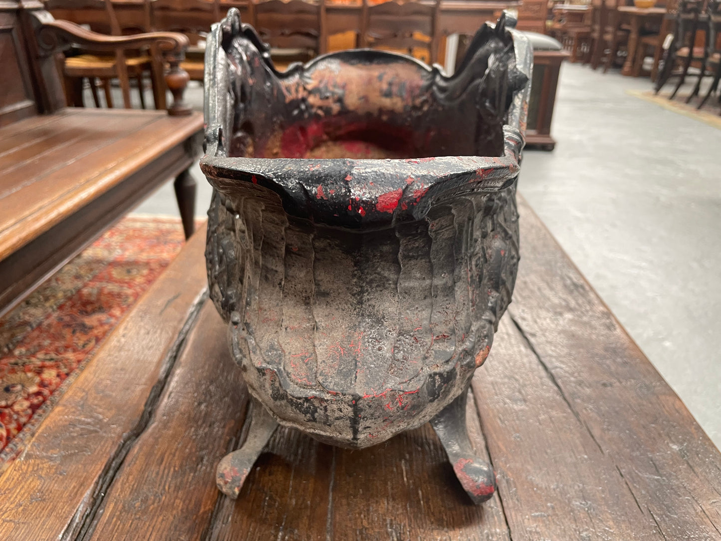 Highly decorative 19th Century French cast iron planter box with beautiful details. there are two matching pots available price is for one. They have been sourced directly from France and are in good original condition.