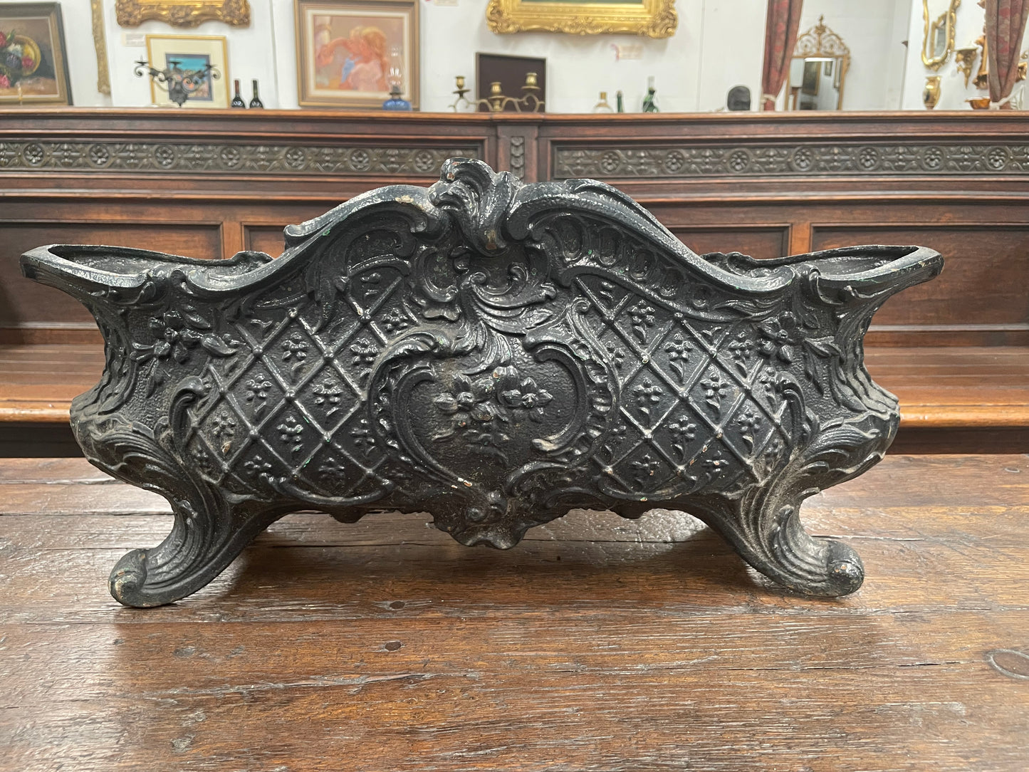 Highly decorative 19th Century French cast iron planter box with beautiful details. there are two matching pots available price is for one. They have been sourced directly from France and are in good original condition.