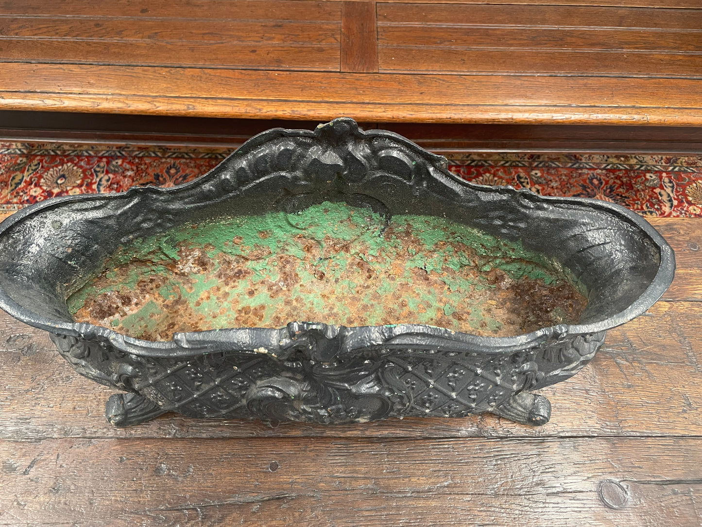 Highly decorative 19th Century French cast iron planter box with beautiful details. there are two matching pots available price is for one. They have been sourced directly from France and are in good original condition.