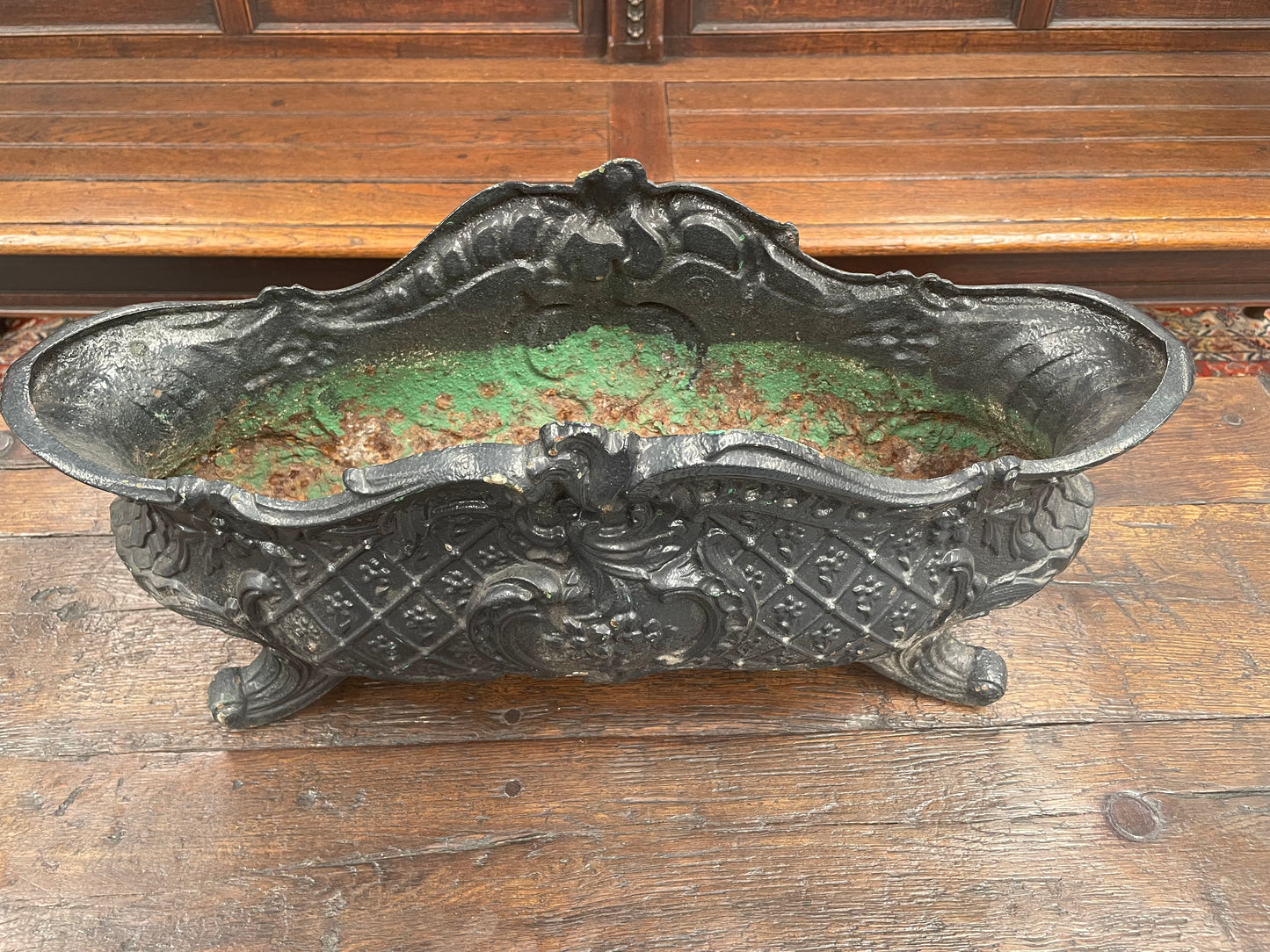 Highly decorative 19th Century French cast iron planter box with beautiful details. there are two matching pots available price is for one. They have been sourced directly from France and are in good original condition.