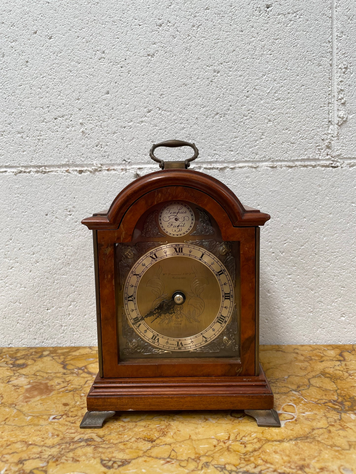Gorgeous miniature Mahogany Elliott of London mantle timepiece retailed by Drummond and Co Melbourne. It is in good working order and in good original detailed condition.