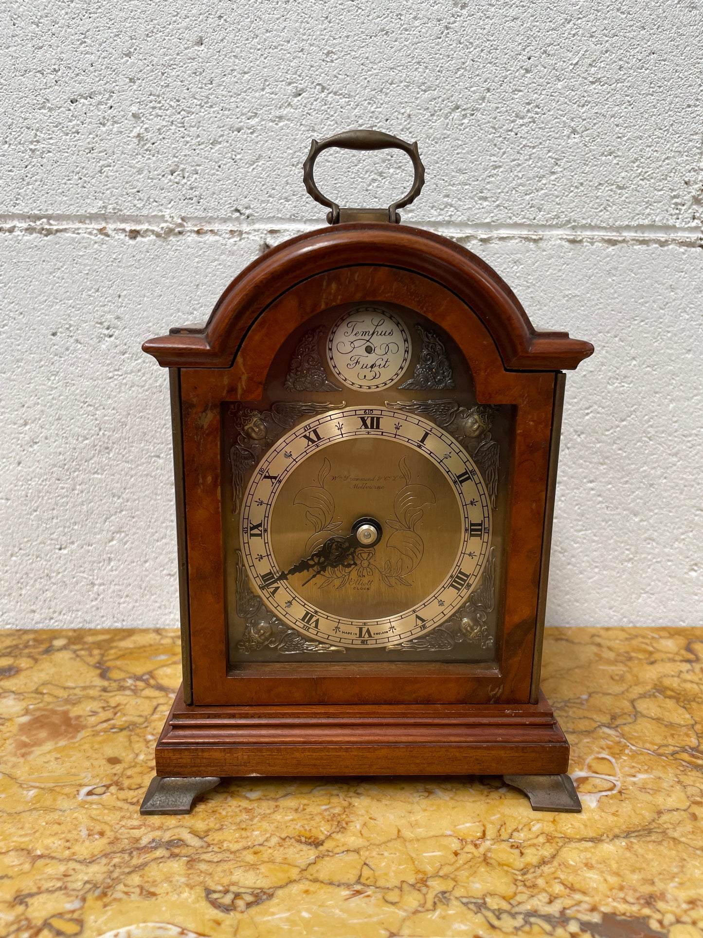 Gorgeous miniature Mahogany Elliott of London mantle timepiece retailed by Drummond and Co Melbourne. It is in good working order and in good original detailed condition.