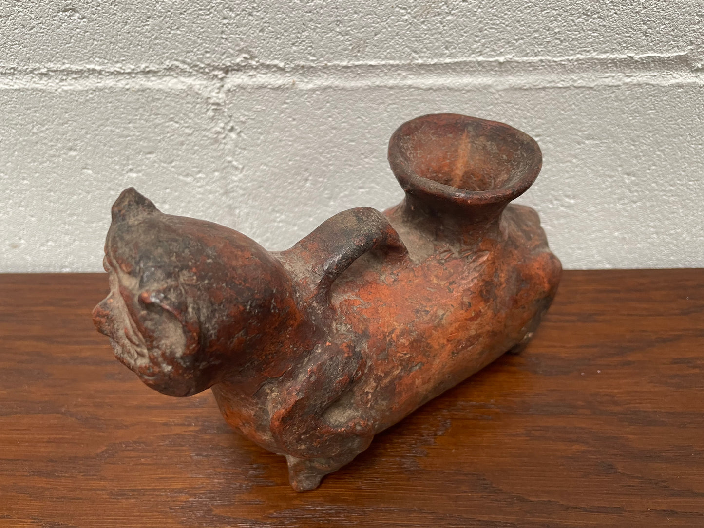 Pre-Columbia terracotta ceramic vessel. Most likely depicting a cat in good condition for its age.