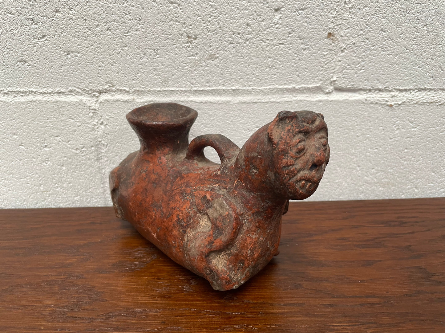 Pre-Columbia terracotta ceramic vessel. Most likely depicting a cat in good condition for its age.