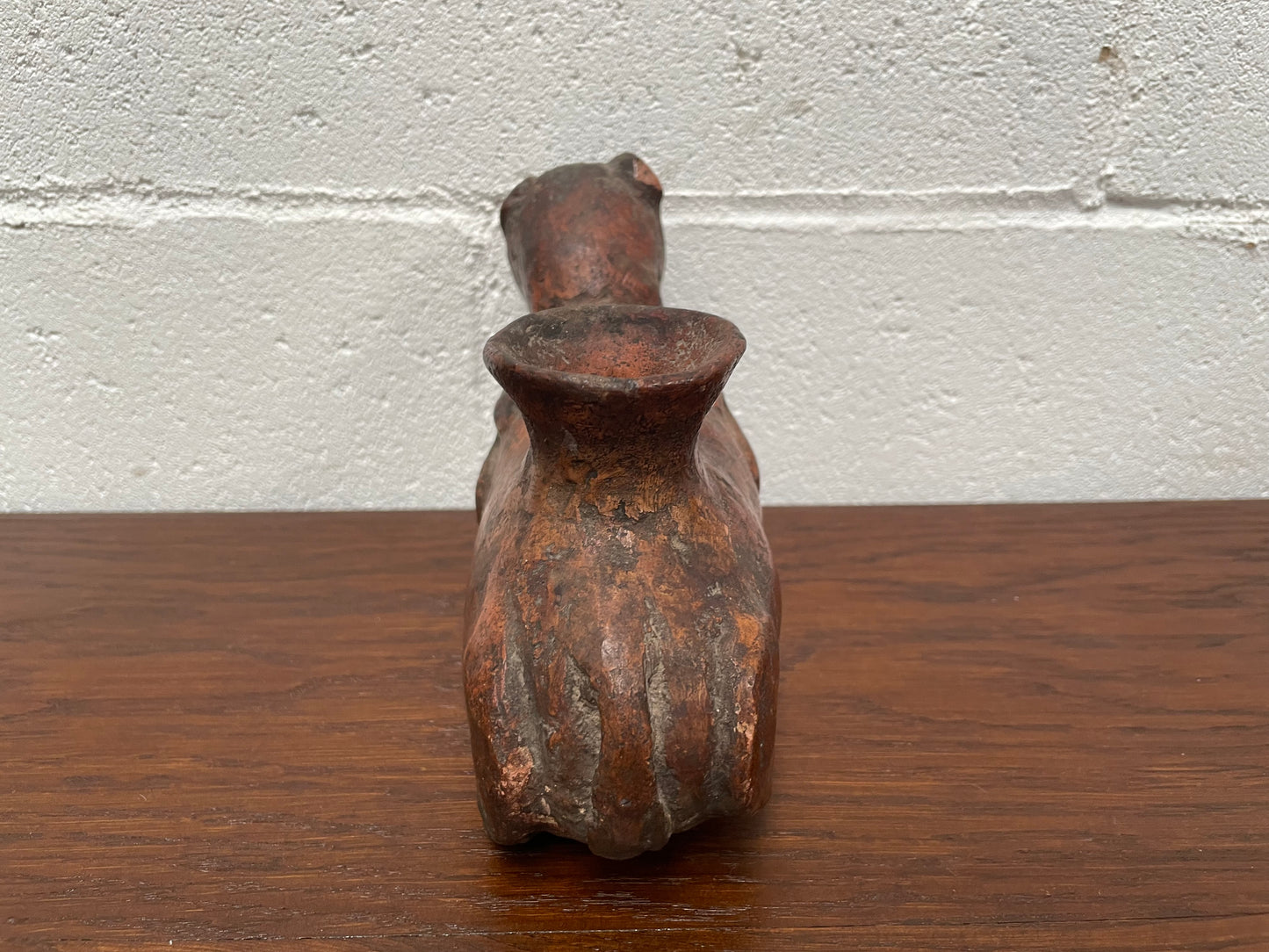 Pre-Columbia terracotta ceramic vessel. Most likely depicting a cat in good condition for its age.