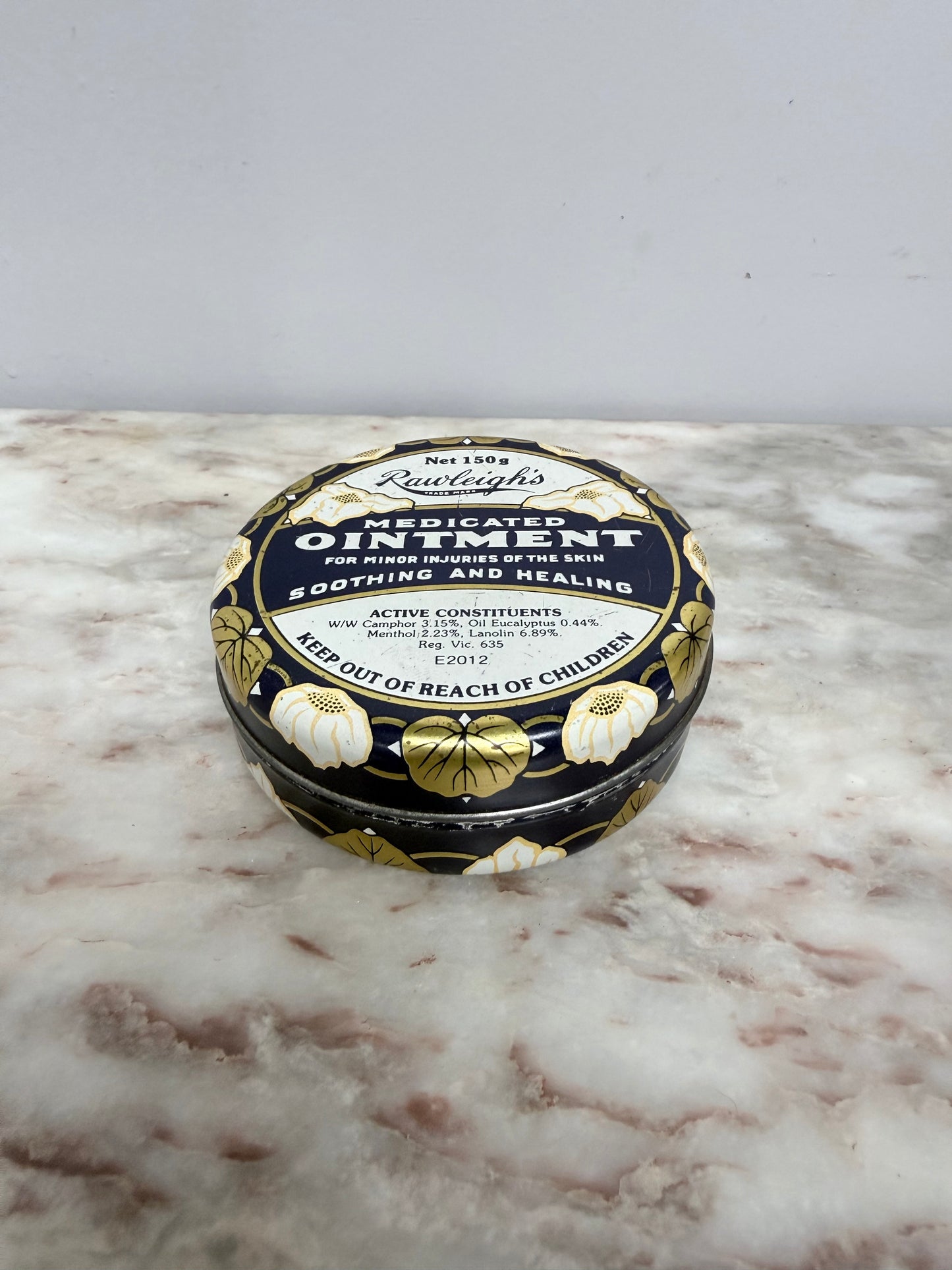 Vintage Rawleigh's Ointment Tin