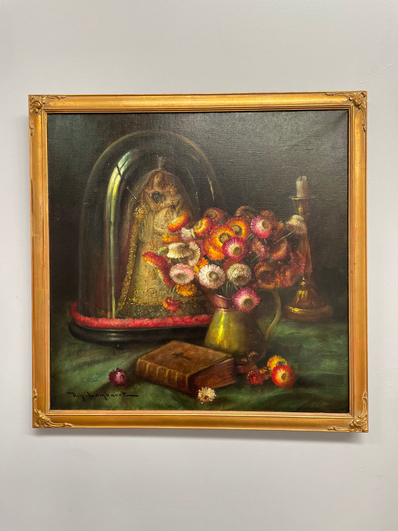 Beautiful French canvas painting of flowers and a bible framed in a lovely gold frame. It is in good original condition.
