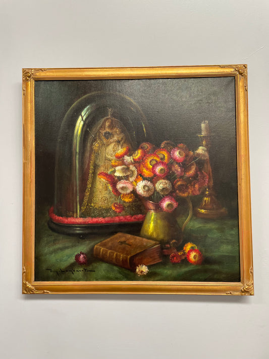 Beautiful French canvas painting of flowers and a bible framed in a lovely gold frame. It is in good original condition.