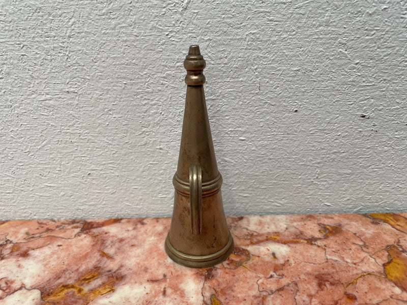 Silver plated Vintage candle snuffer with a handle on the side. Sourced locally and is in good original condition.