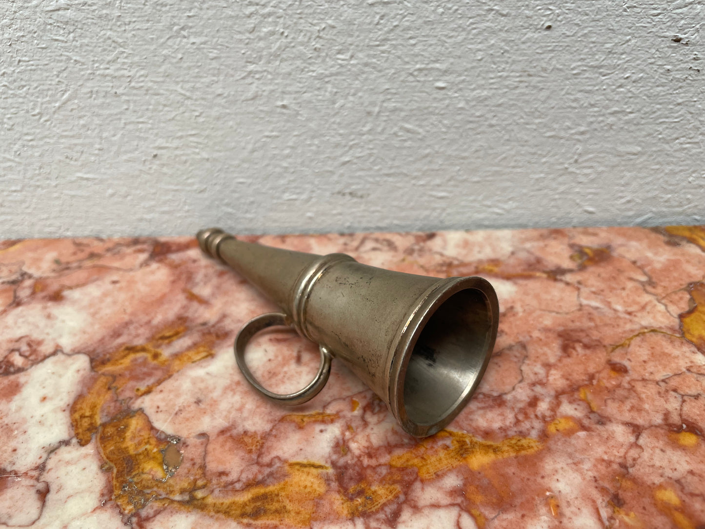 Silver plated Vintage candle snuffer with a handle on the side. Sourced locally and is in good original condition.