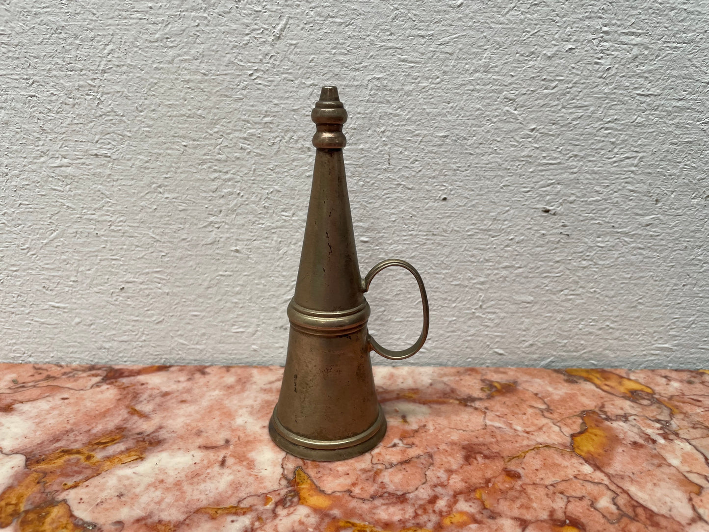 Silver plated Vintage candle snuffer with a handle on the side. Sourced locally and is in good original condition.