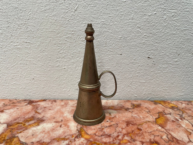 Silver plated Vintage candle snuffer with a handle on the side. Sourced locally and is in good original condition.