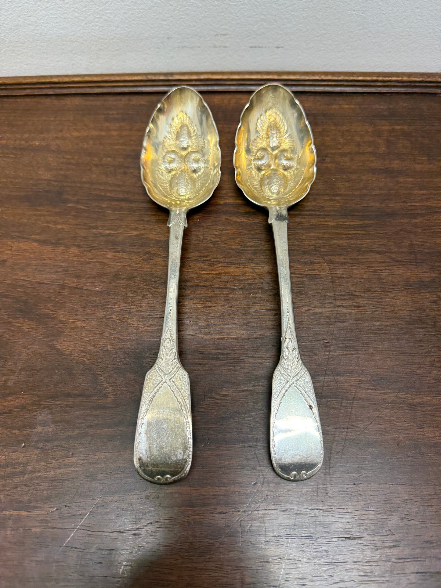 Matched Pair Georgian Sterling Silver Berry Spoons