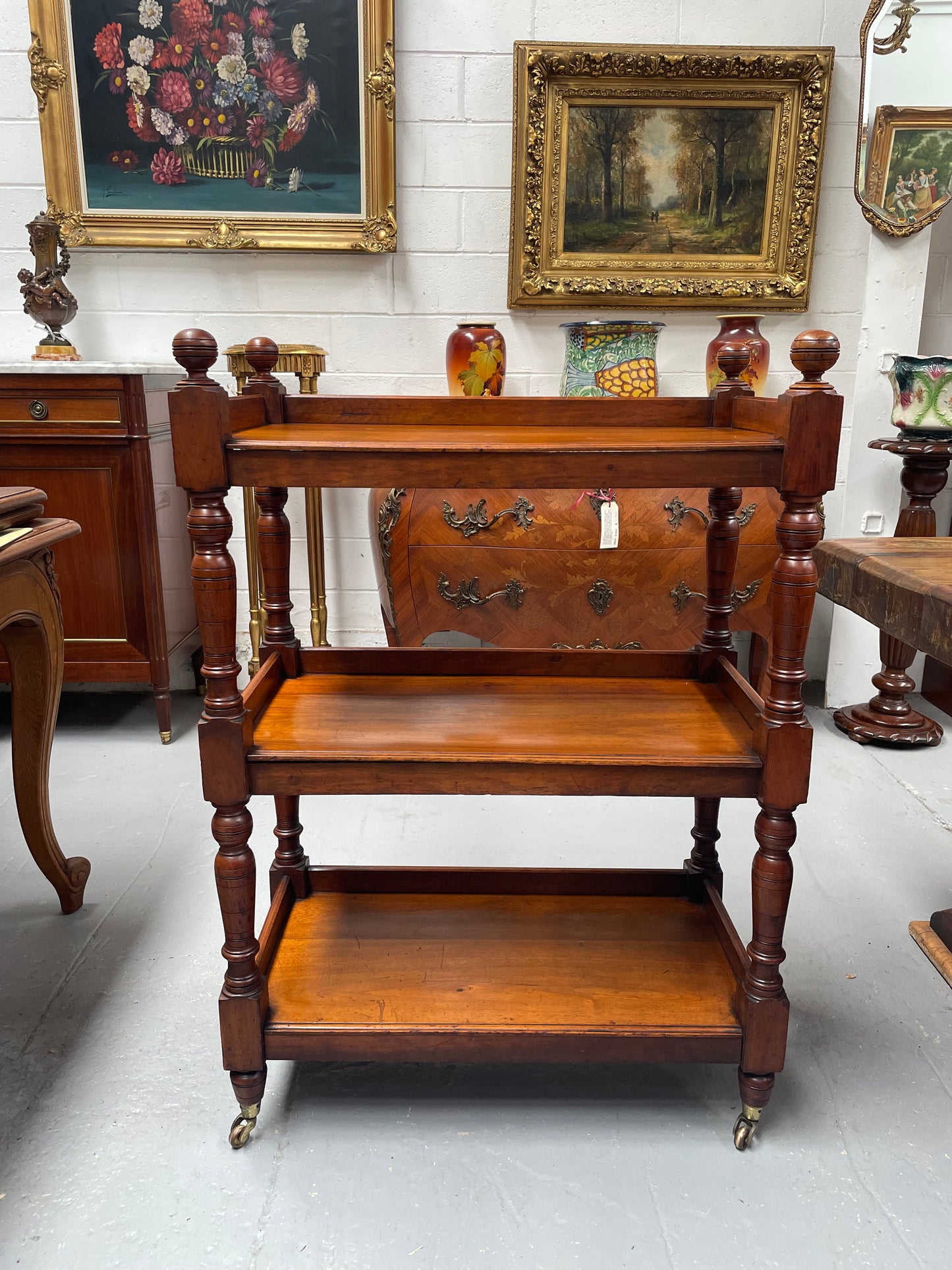 Three tier late Victorian Walnut dumb waiter. Sourced locally and circa 1890's. It is in good original detailed condition.