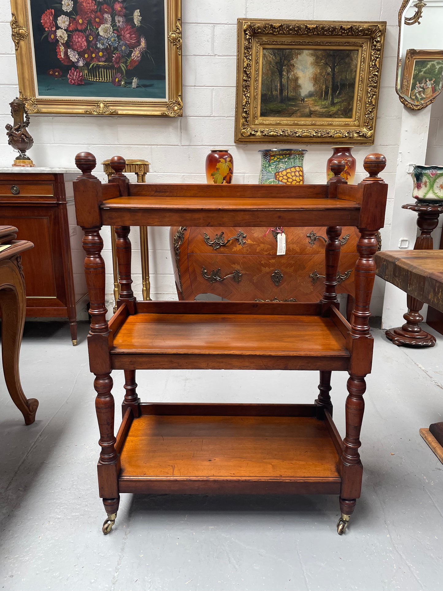 Three tier late Victorian Walnut dumb waiter. Sourced locally and circa 1890's. It is in good original detailed condition.