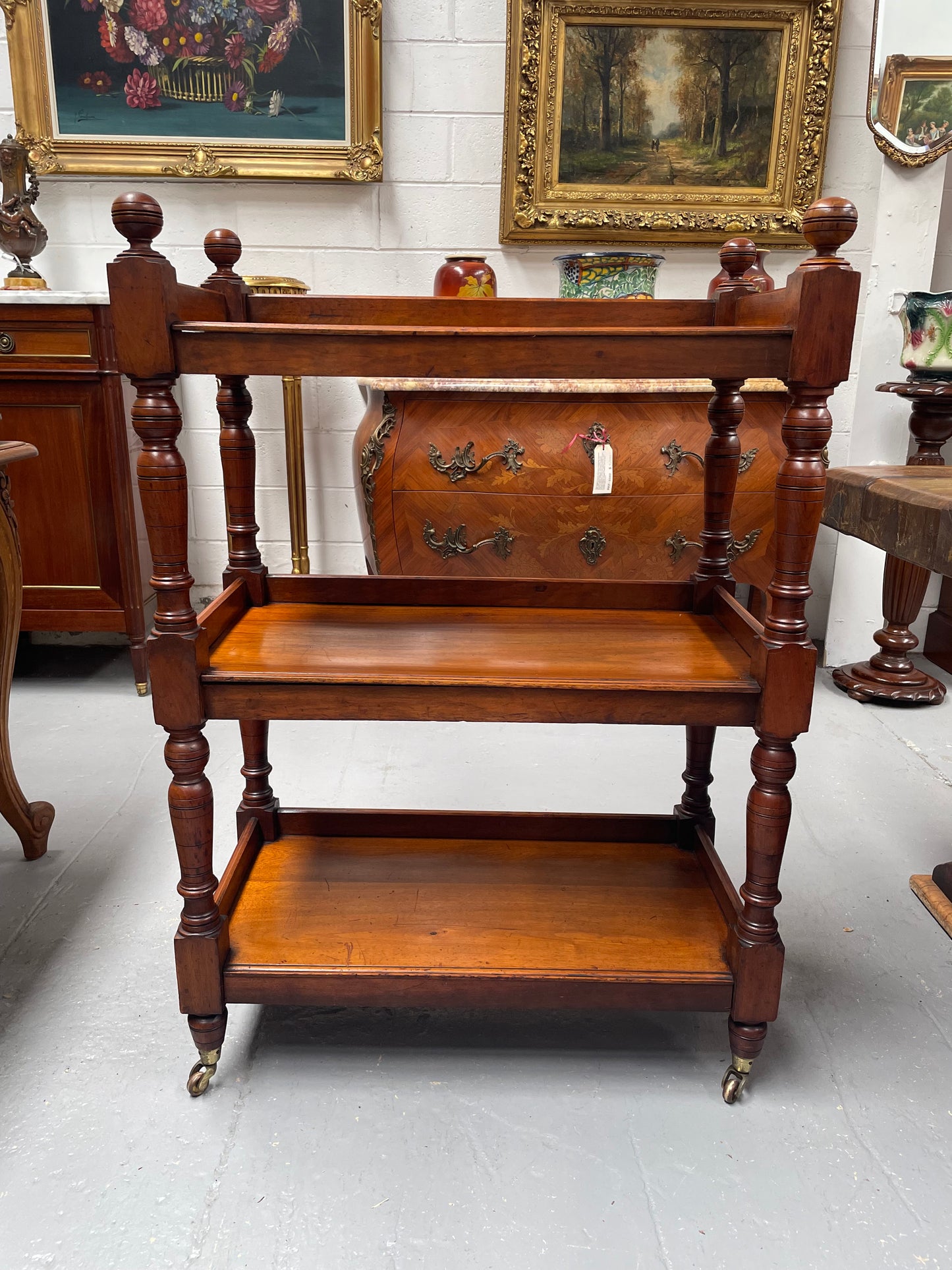 Three tier late Victorian Walnut dumb waiter. Sourced locally and circa 1890's. It is in good original detailed condition.