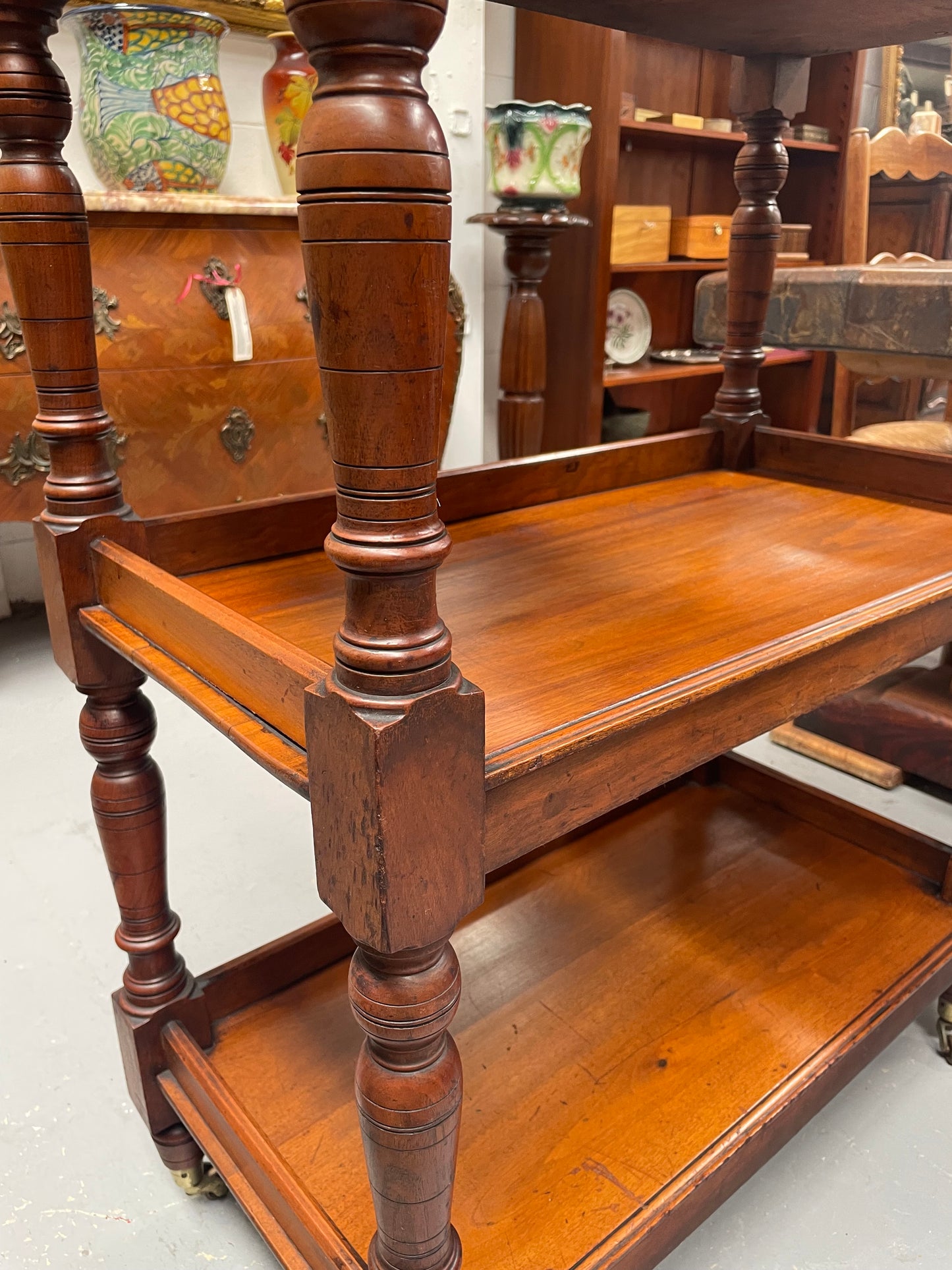 Three tier late Victorian Walnut dumb waiter. Sourced locally and circa 1890's. It is in good original detailed condition.