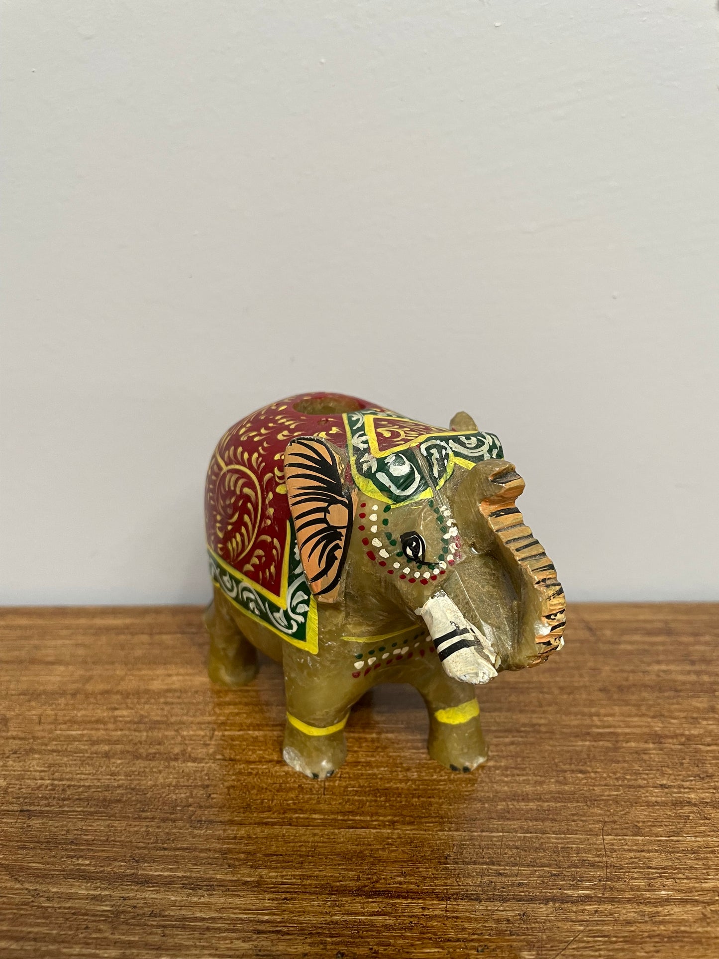 Vintage carved hardstone Indian elephant which has been hand painted. In good condition. Please see photos as they form part of the description and condition.