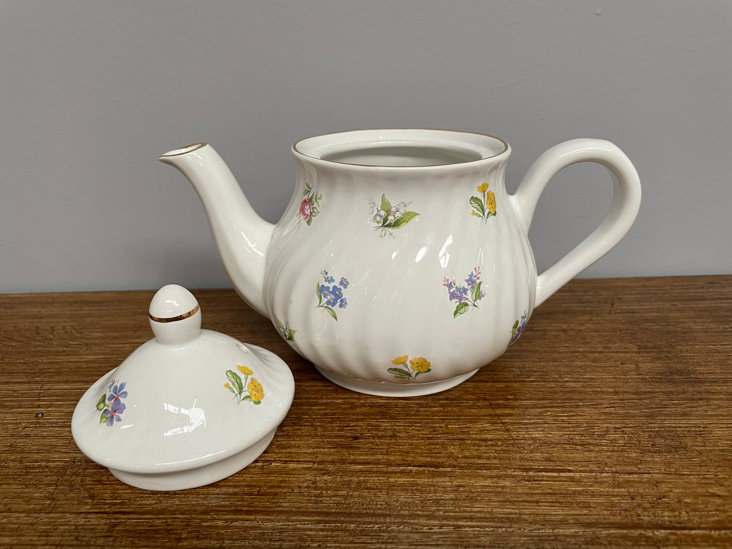 Pretty Arthur Wood & Sons small teapot depicting sprays of flowers. In good original condition.