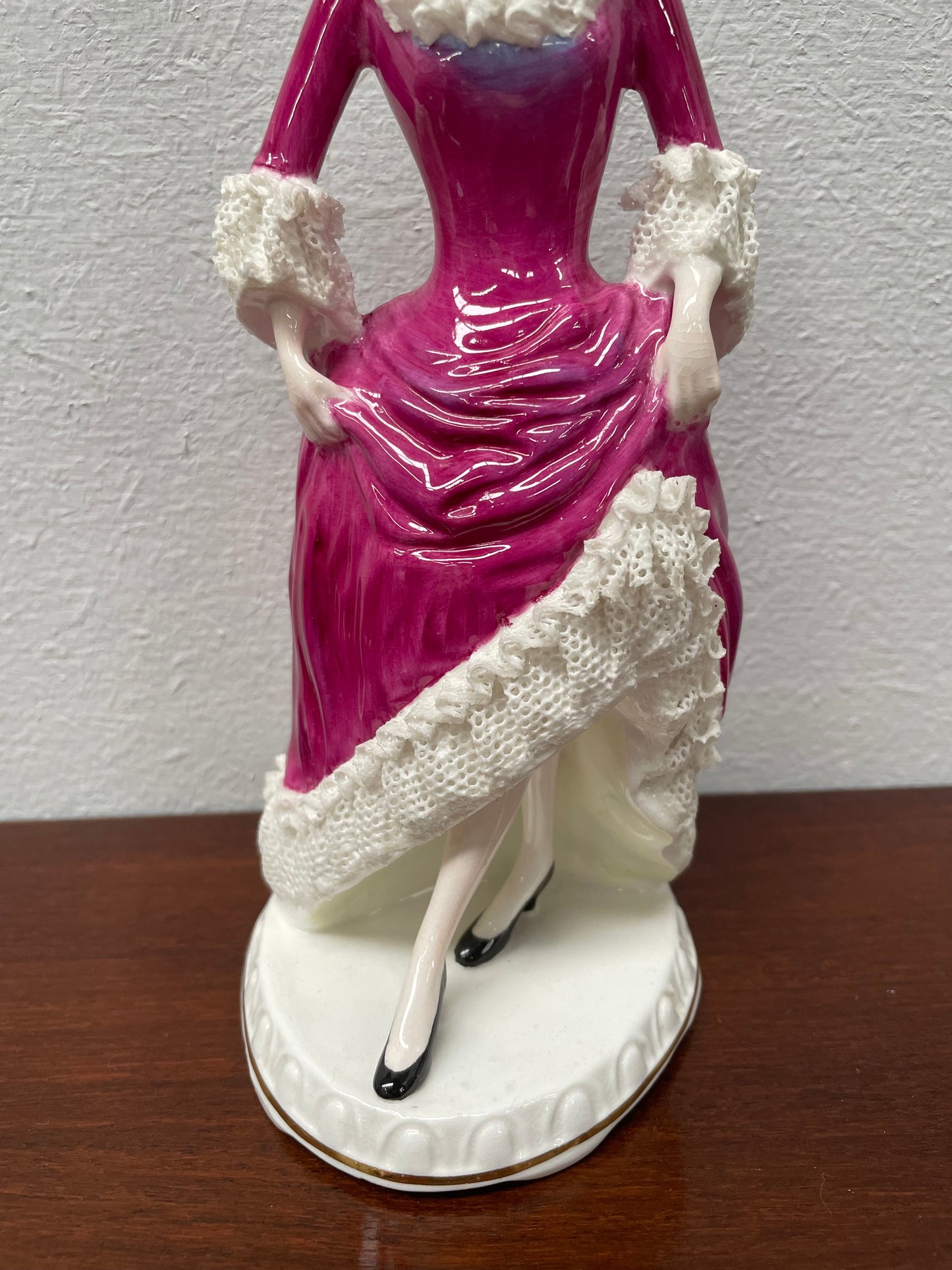 Beautiful English Staffordshire bone china lady figurine with lace. It is in good vintage condition. Please view photos as they help form part of the description.
