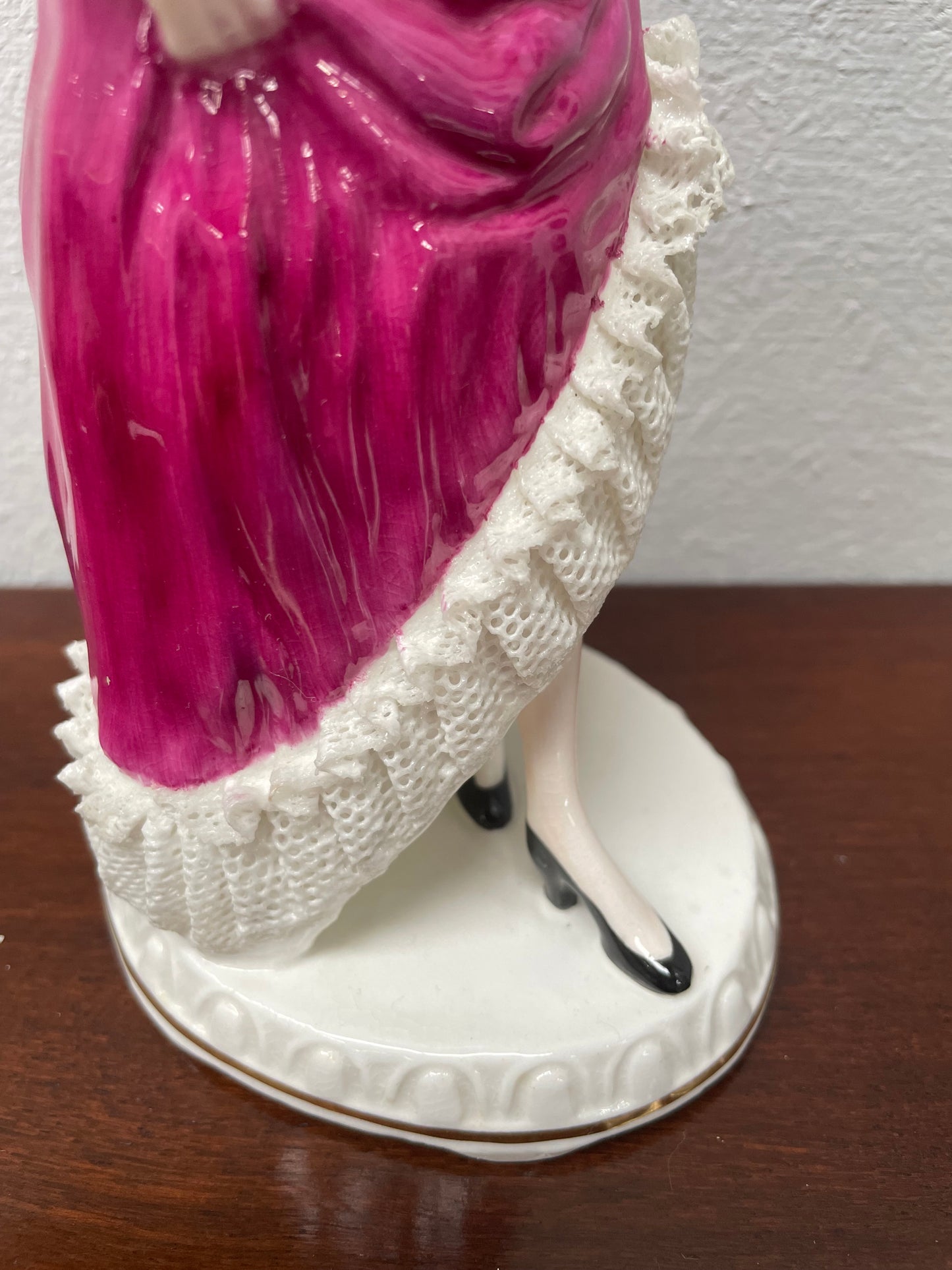 Beautiful English Staffordshire bone china lady figurine with lace. It is in good vintage condition. Please view photos as they help form part of the description.