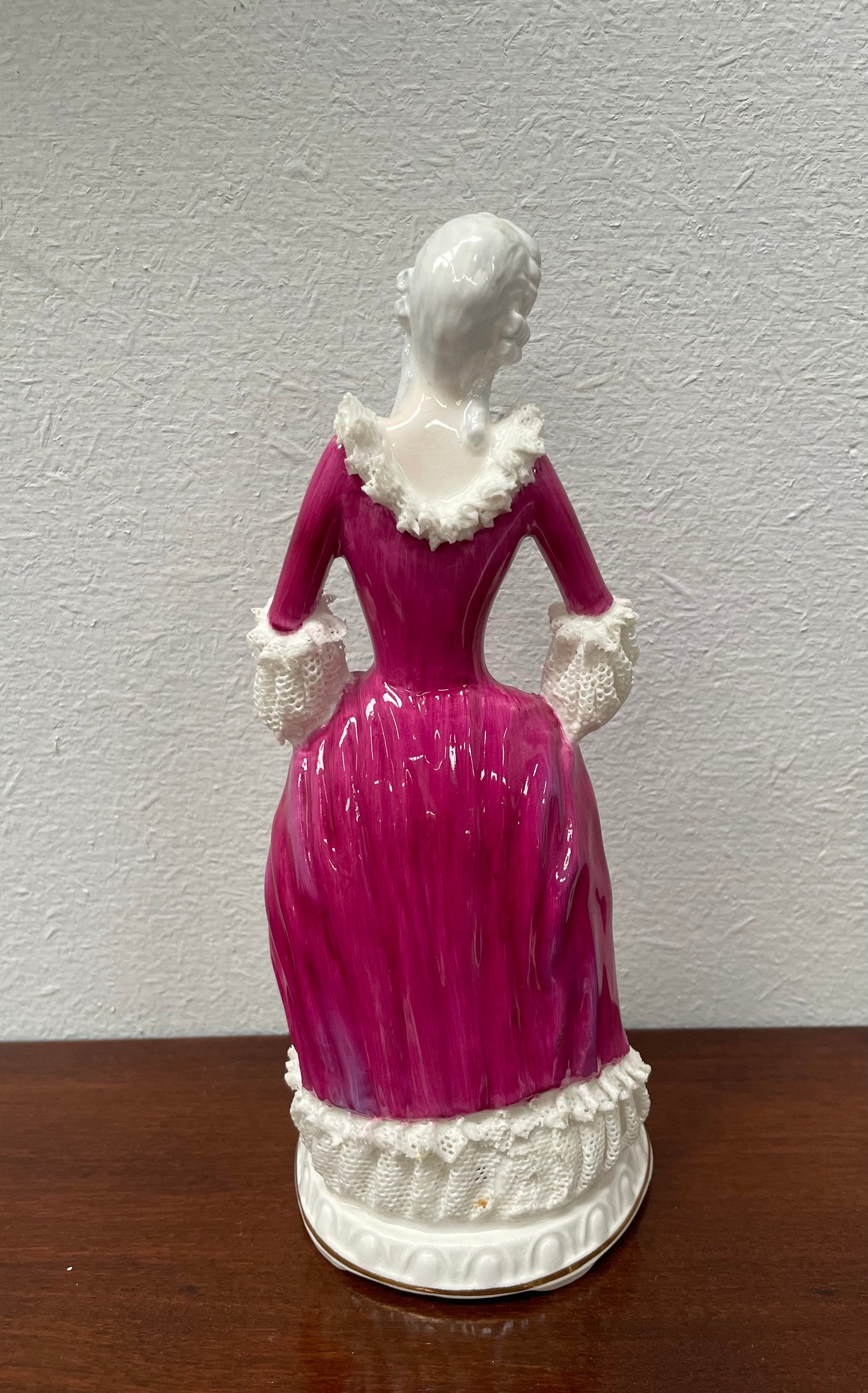 Beautiful English Staffordshire bone china lady figurine with lace. It is in good vintage condition. Please view photos as they help form part of the description.