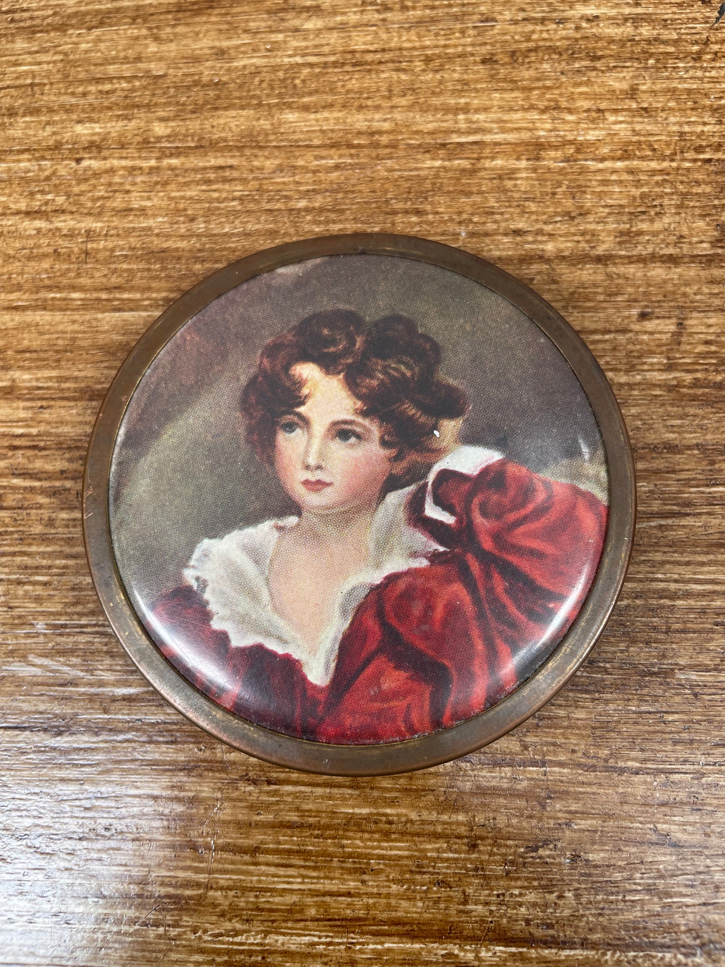 Vintage Compact Featuring A Portrait Lid
