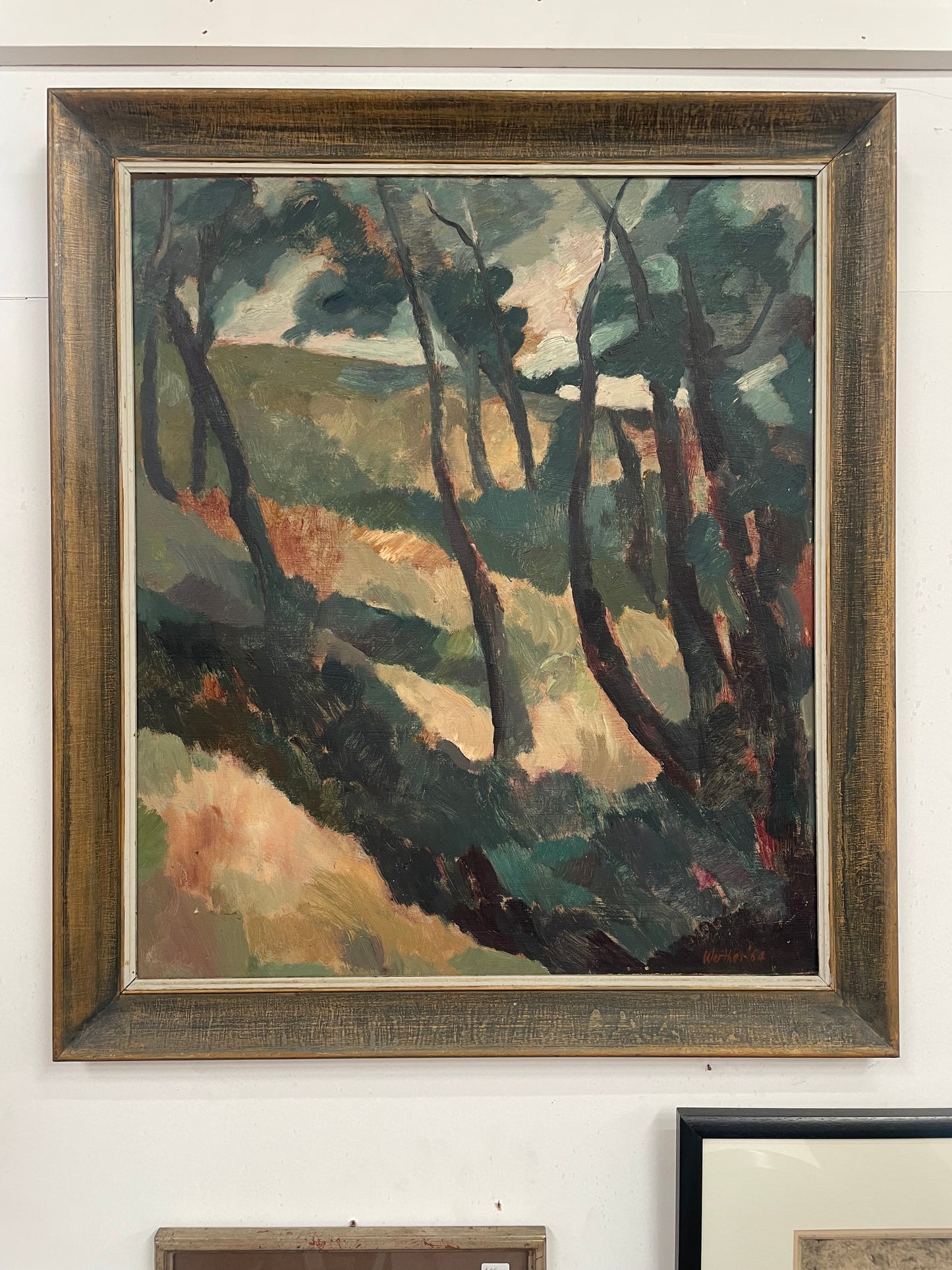 This oil on board landscape painting by Frank Werther (1922-2010) is presented in a beautiful frame and features a vivid color scheme. It is in good original condition and it is ready to be displayed on your wall. The artist's signature can be seen in the accompanying pictures.
