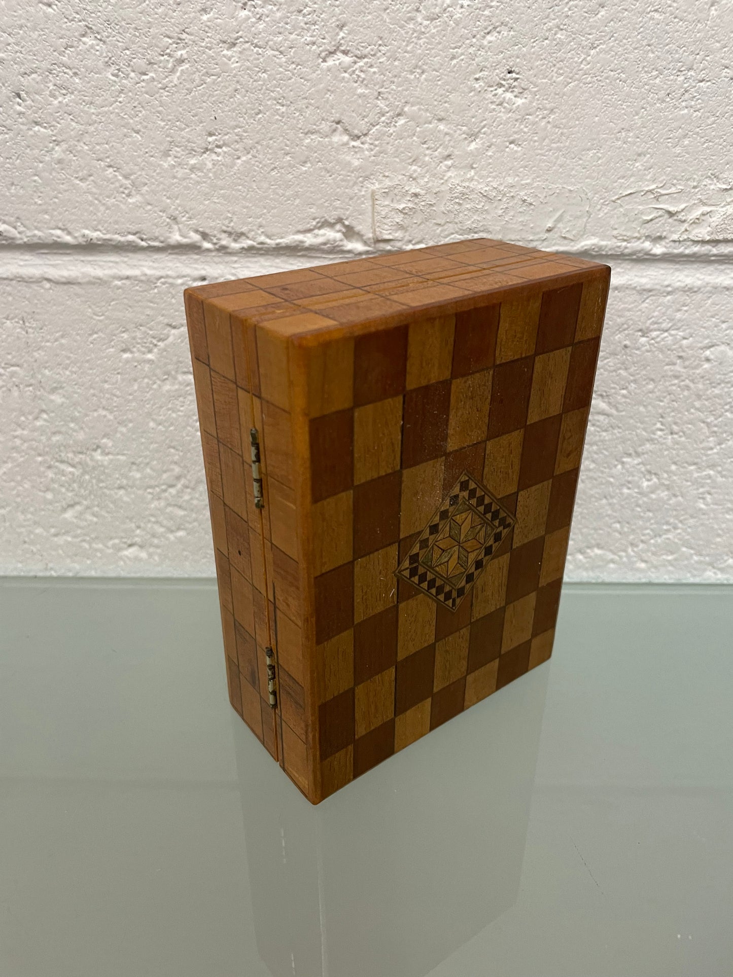 Beautiful Vintage inlaid wooden trinket box with a velvet base and mirror inside. It is in good original condition.