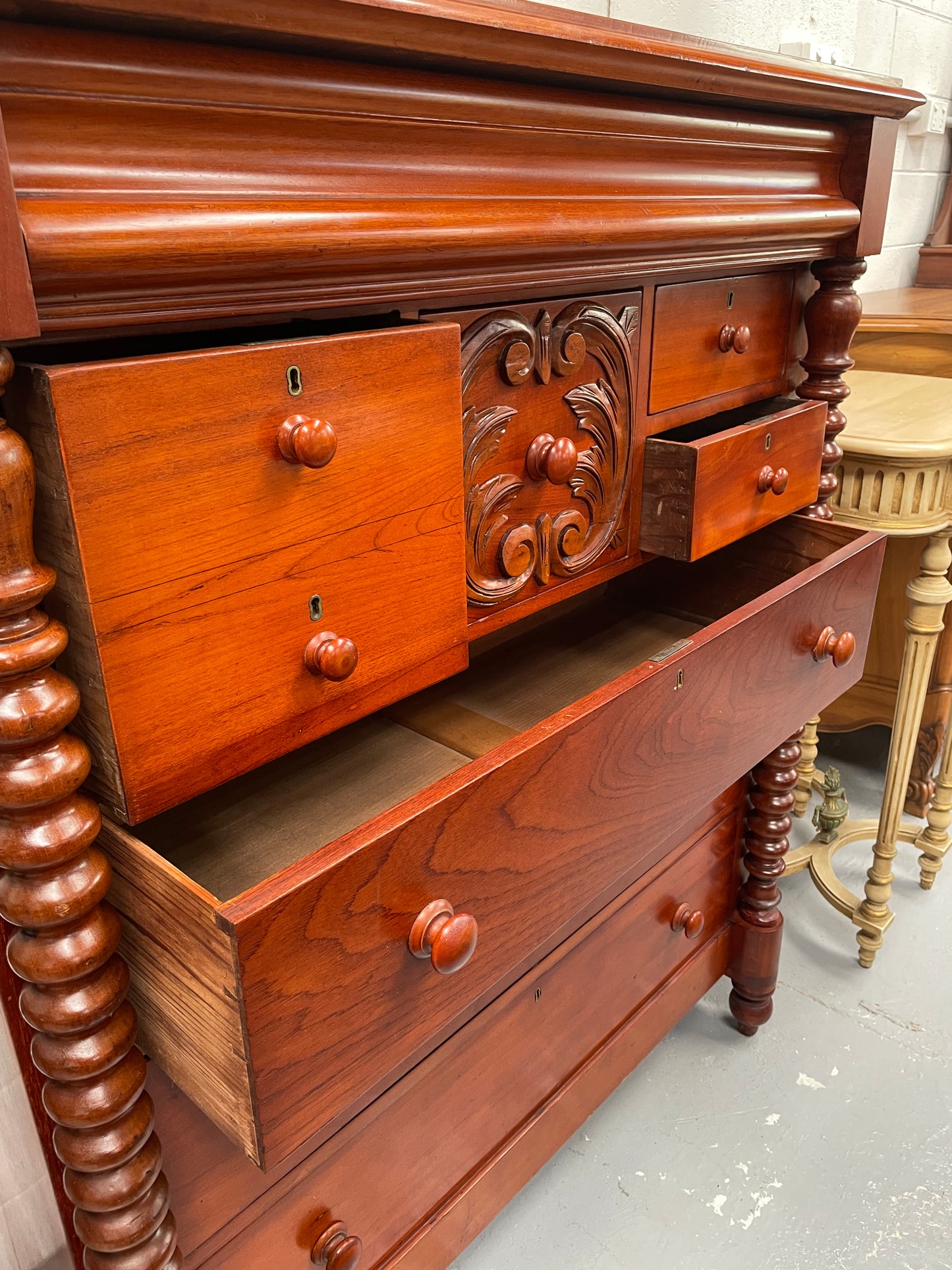 Victorian Cedar chest of drawers with decorative <span data-mce-fragment="1">twist columns and </span>carvings. It consists of eight drawers so plenty of storage. It has been sourced locally and is in good original detailed condition.